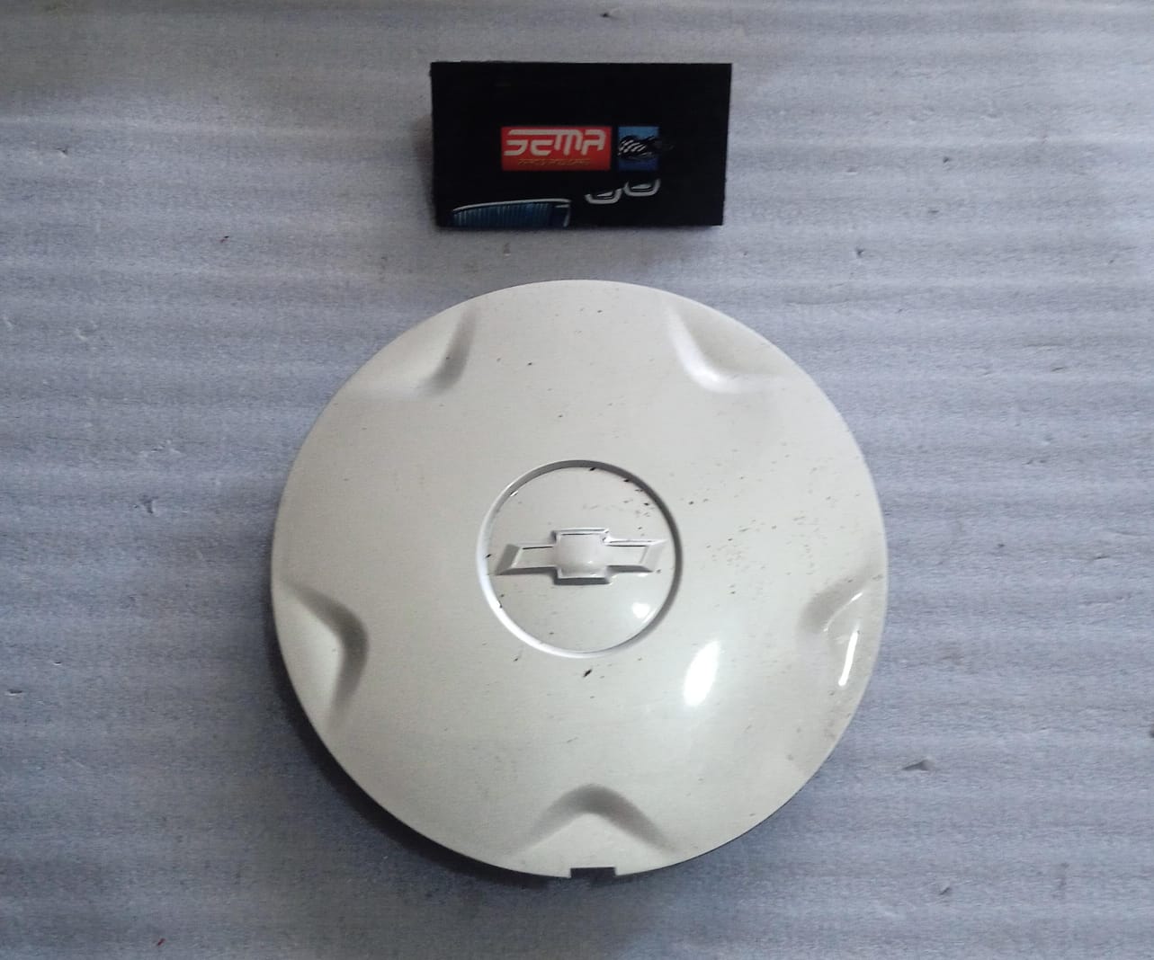TAPON CENTRO DE RIN CEHVROLET SPARK 2018-2022 94579127